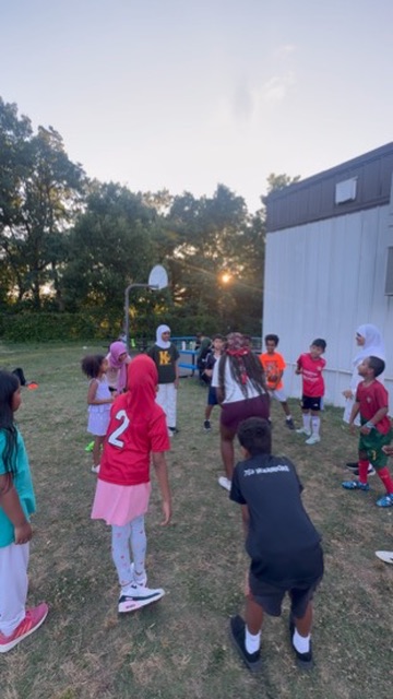 SOS training session on the field with coaches and players