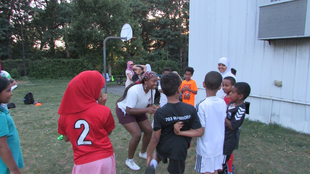 703 Warriors team huddle with coaches