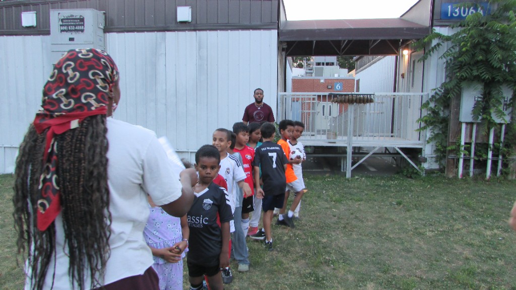Youth soccer practice with SOS mentors