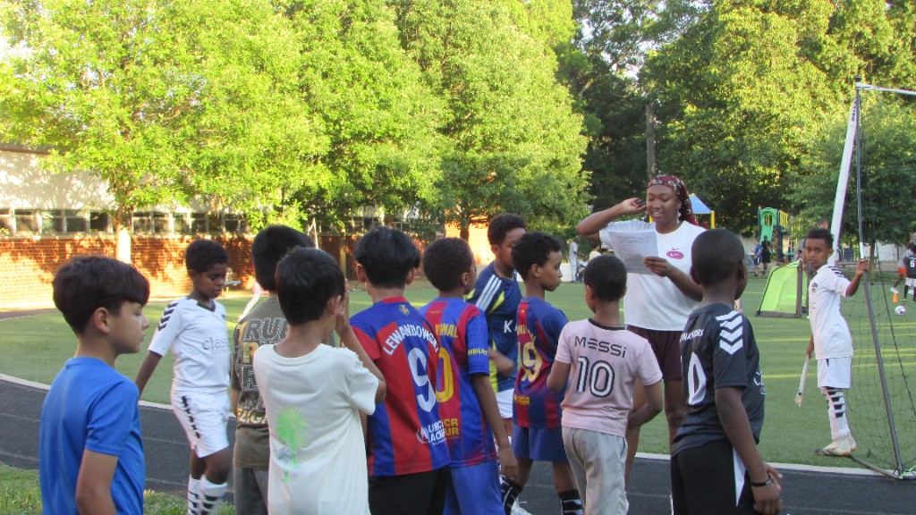SOS training moment with diverse young players