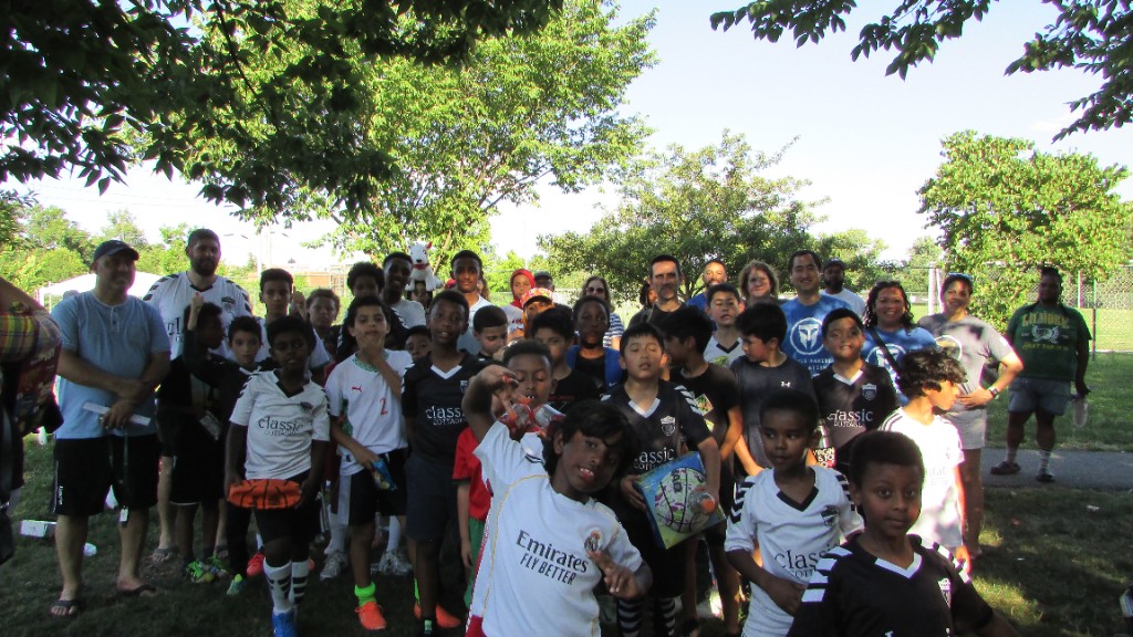 SOS mentors on the field during training