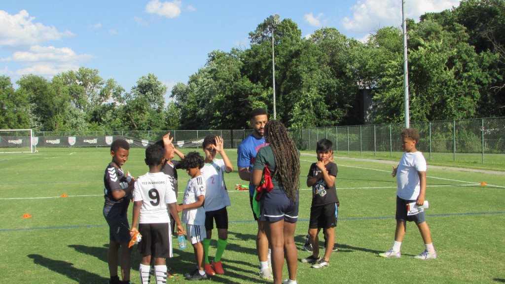Youth soccer training session with SOS coaches