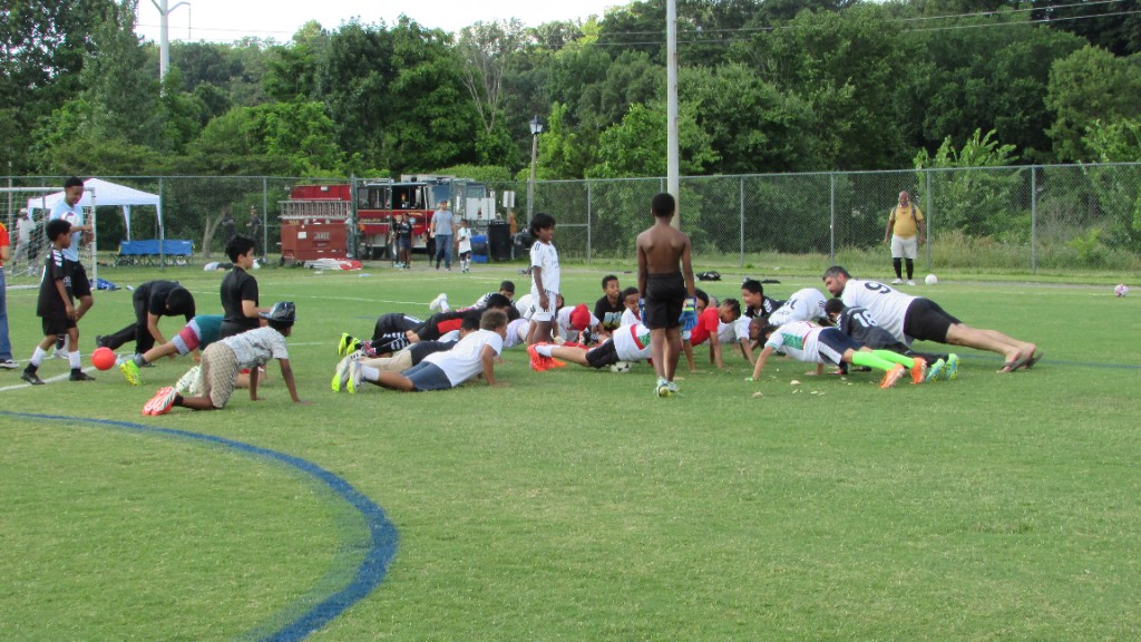 703 Warriors team moment on the field
