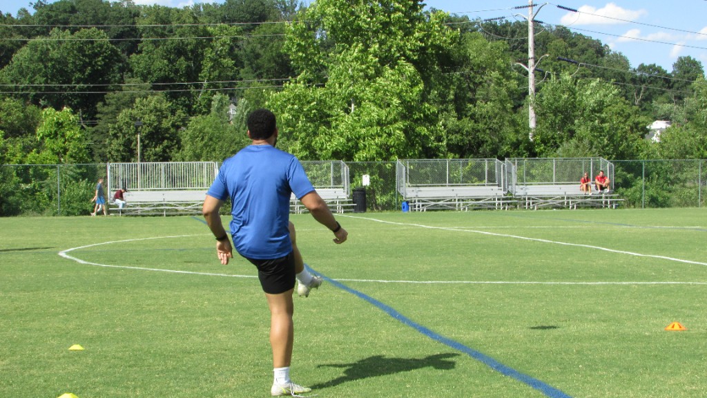 SOS mentors leading outdoor sports activity