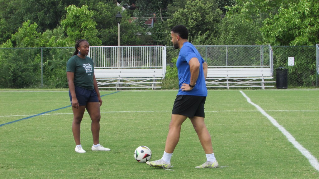 Coaches and players during community event